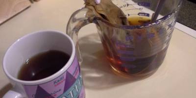 mama O making coffee when her coffee maker broke.