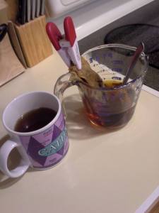 mama O making coffee when her coffee maker broke.